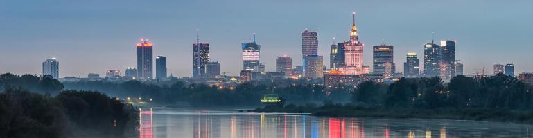 Panorama of Warsaw in the evening. Skyline of the Polish city with the Vistula River in the foreground | Seacon Logistics 